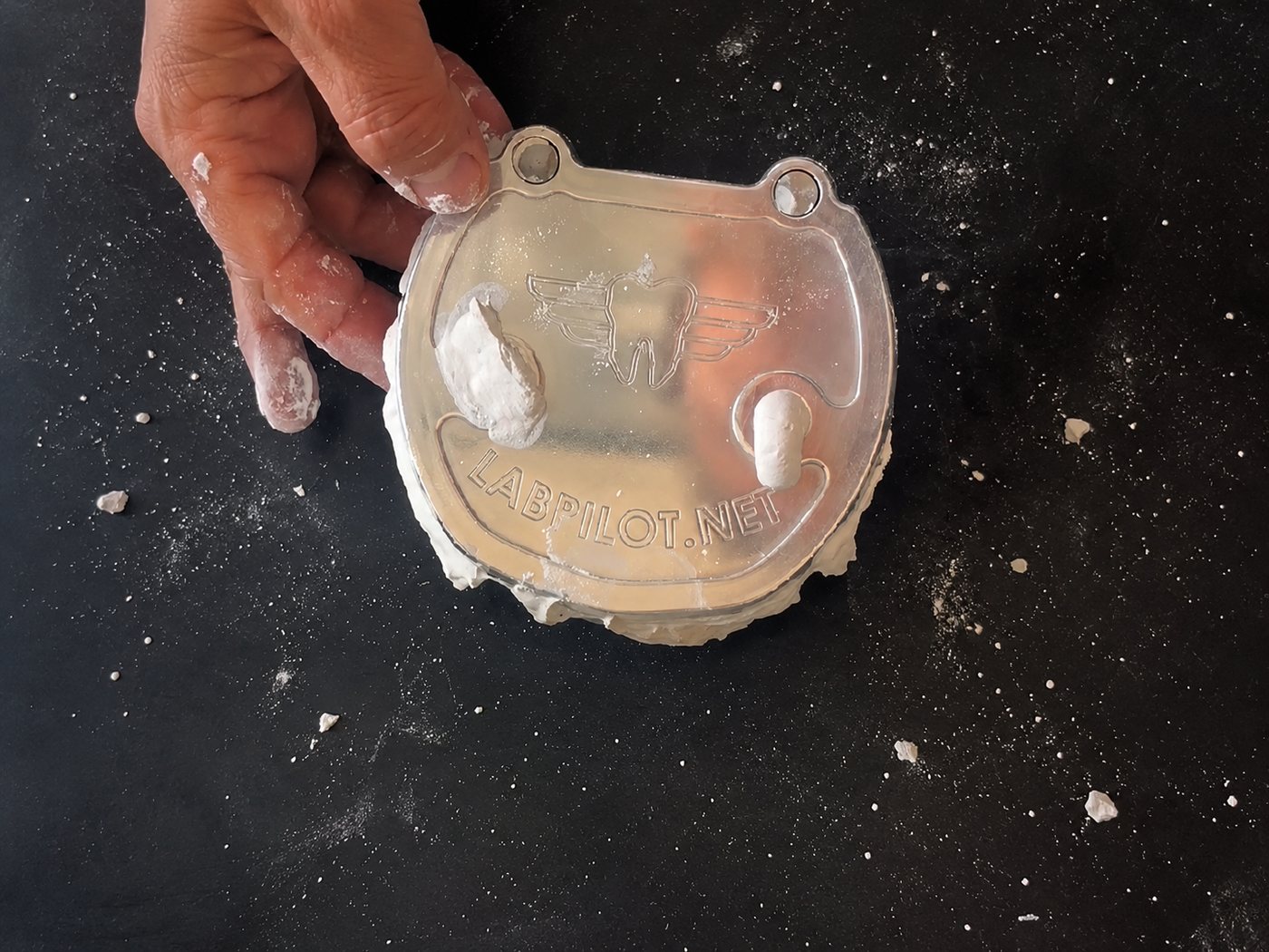 LabPilot flask lid pressed on, with plaster exuding at the edges